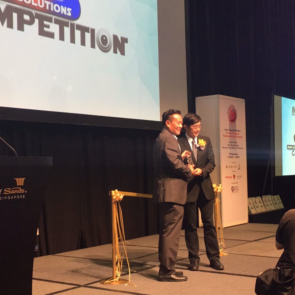 Mr Chow receiving a prize at the Smart Security Solutions Competition 2016